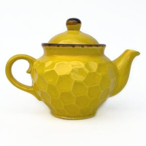 Handmade yellow ceramic teapot solokha