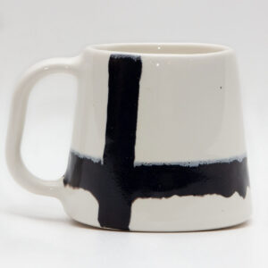 Handmade white ceramic mug with black stripes