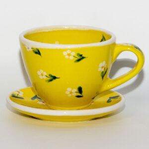 Yellow tea-set with flowers