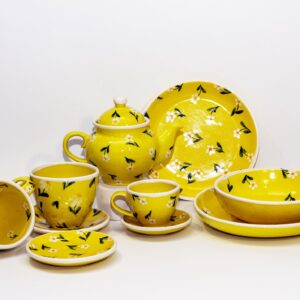 Yellow tea-set with flowers