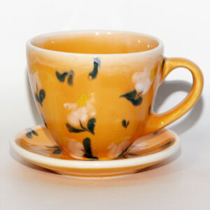 Orange tea-set with flowers