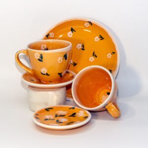 Orange tea-set with flowers