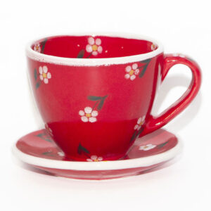 Red tea-set with flowers